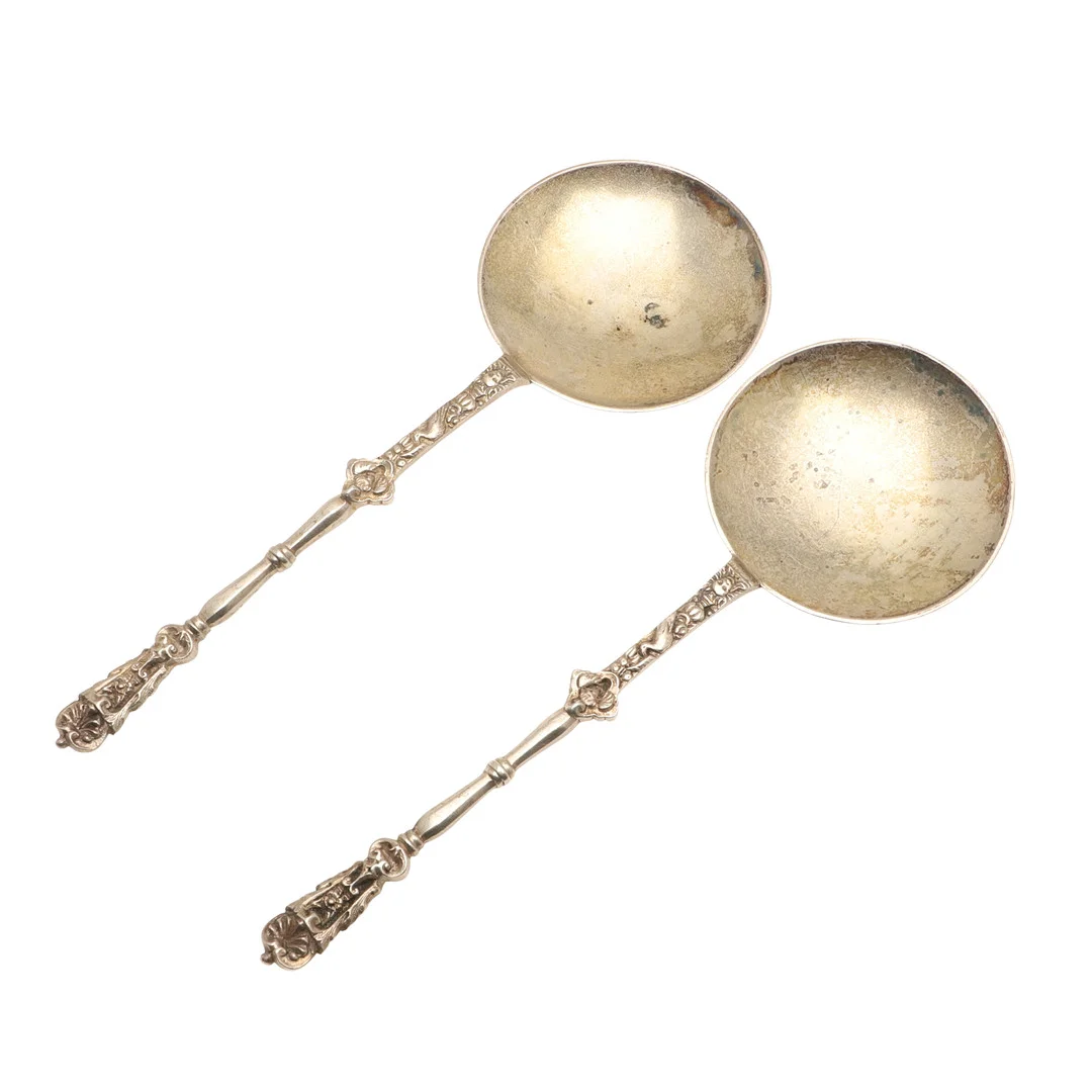 A PAIR OF LATE VICTORIAN SILVER SPOONS. — Silver — Lawrences Auctioneers