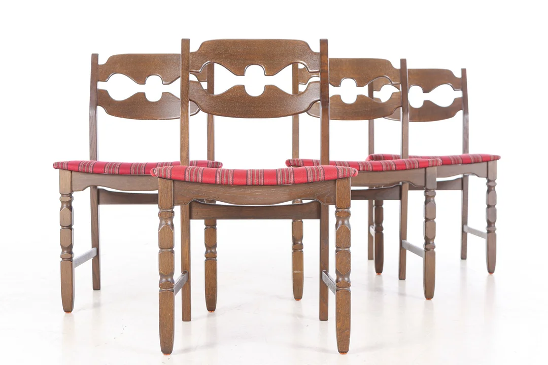 Henry Kjærnulf. Four chairs of stained oak, model 66. (4) — Furniture/Chairs — Lauritz