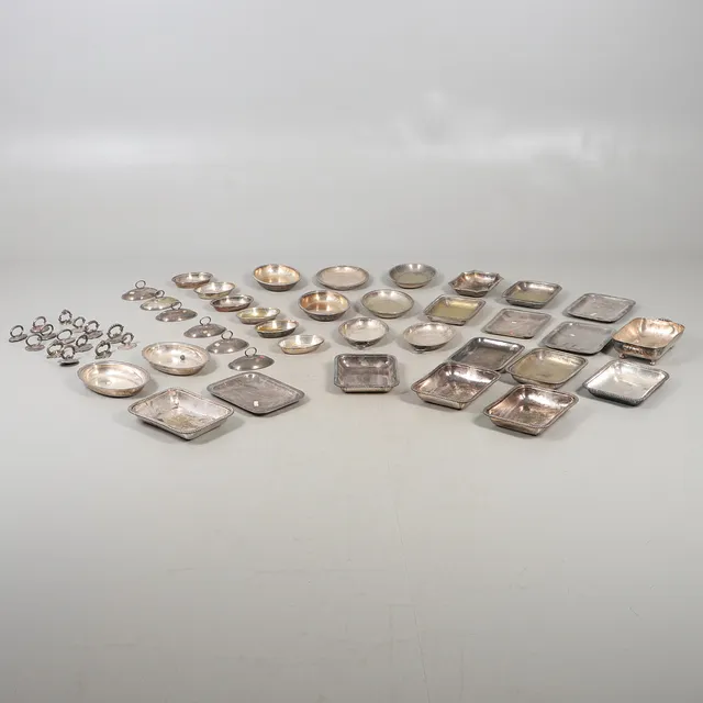 A QUANTITY OF SILVER PLATED SERVING DISH PARTS ETC.