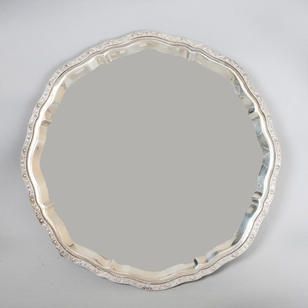 AN ELIZABETH II SILVER SALVER. — Silver — Bishop & Miller