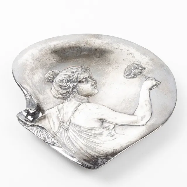 FAT, Jugend, dekor med kvinna i relief, sekelskiftet 1900.