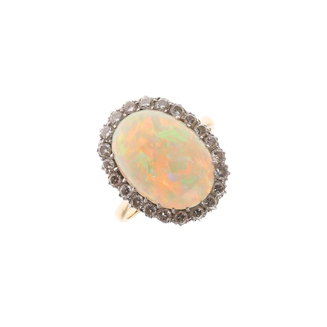 AN OPAL AND DIAMOND CLUSTER RING. — Rings — Lawrences Auctioneers
