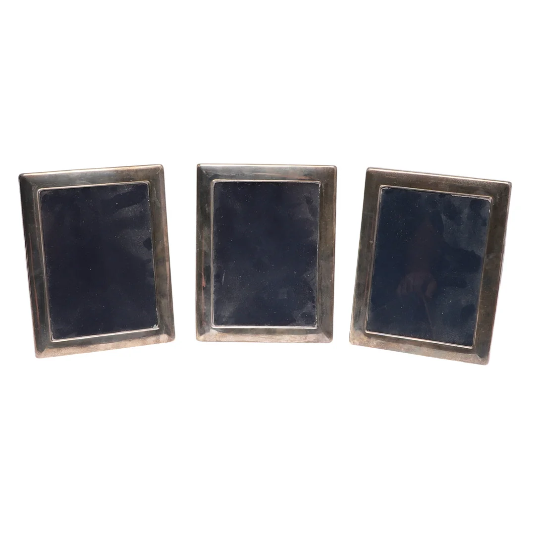 A PAIR OF ELIZABETH II SILVER PHOTOGRAPH FRAMES. — Silver — Lawrences Auctioneers