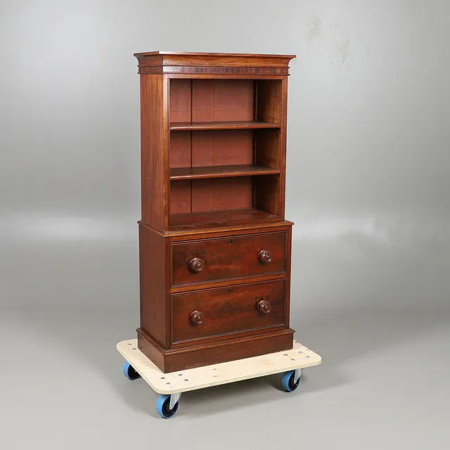 A SMALL VICTORIAN MAHOGANY TWO DRAWER BOOKCASE.