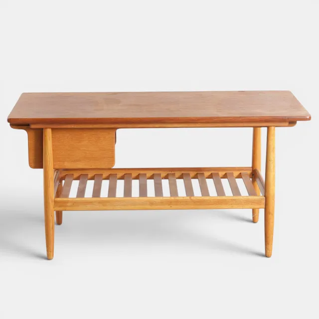 EJVIND A. JOHANSSON. Sofabord med plade af teak, stel af massiv eg, ender med hhv. skuffe samt udtræksplade med formica. Formgivet 1958. Fremstillet hos C.M. Madsen for FDB. Danmark, 1950-60'erne.