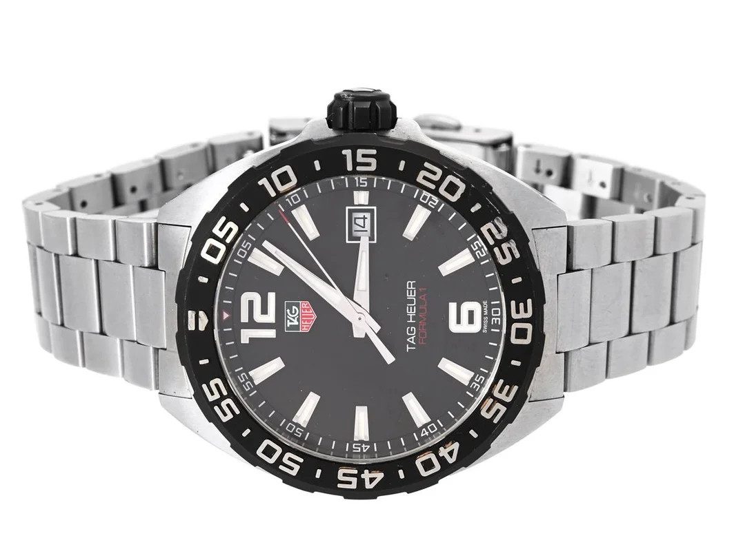 TAG HEUER, Formula 1, Serie nr. WHP5287, Ref nr. WAZ1110.BA0875, Boett nr. WAZ1110, herrur, 41 mm, stål, quartz, safirglas, datum, originallänk, viklås, Ref nr. FAA073-0/3194 G, cert, september 2021, box (skadad), ytterkartong. — Klockor/Tag Heuer — Kaplans
