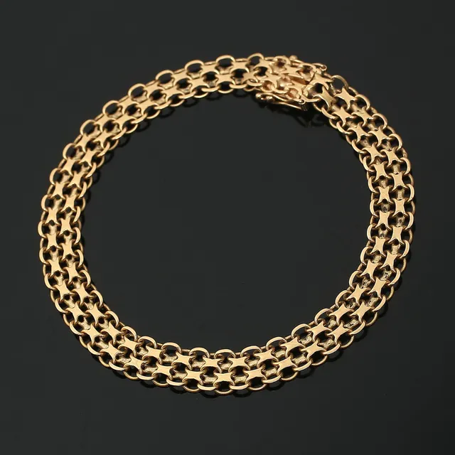 ARMBAND, 18K guld, X-länk, Stockholm 1965.
