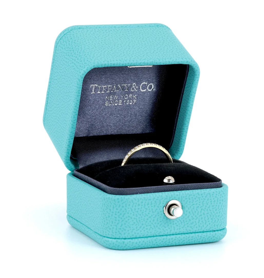 TIFFANY & CO 18CT GOLD DIAMOND SET HALF ETERNITY RING. — Rings — Chalkwell Auctions