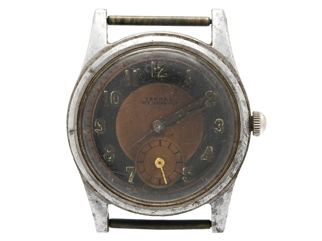 TÄRNAN, herrur, 31 mm, stål, manuell, plexiglas, liten sekundvisare, skadad urtavla, ca 1945. — Klockor/Tärnan — Kaplans