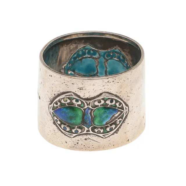 LIBERTY AND CO A SILVER AND ENAMEL LARGE SIZE NAPKIN RING.