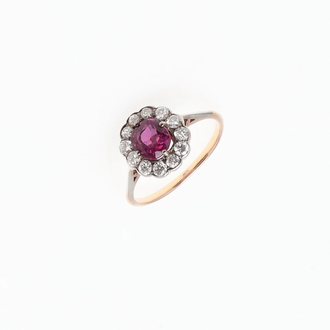 A PINK SAPPHIRE AND DIAMOND CLUSTER RING. — Rings — Lawrences Auctioneers