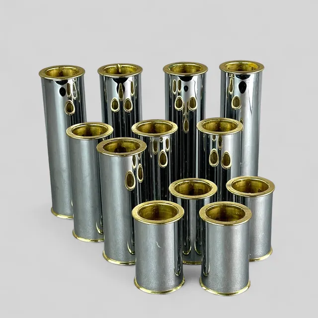 STAFFAN ENGLESSON. Ljusstakar, 12 st. "Cylinder 2000", mässing och metall, nutida.
