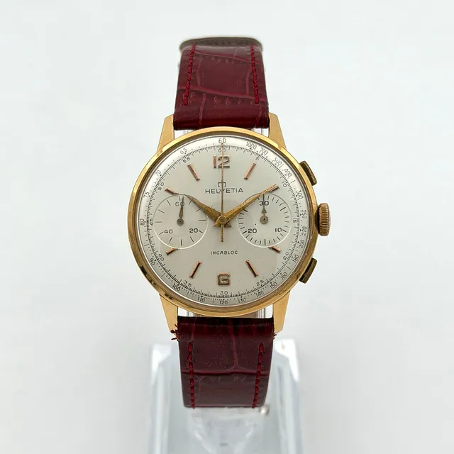 HELVETIA, kronograf, armbandsur, 1950/60-tal, manuell, guld 18k.