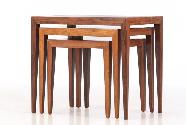 Severin Hansen for Haslev Møbelsnedkeri. A set of rosewood insert tables, 1960s (3)