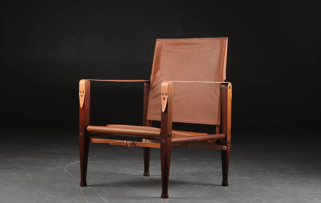 Kaare Klint. Safari chair upholstered in cognac-coloured aniline leather — Furniture/Lounge chairs — Lauritz