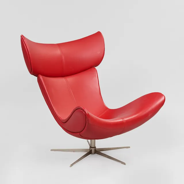 HENRIK PEDERSEN. "Imola", lænestol betrukket med rødt skind, fempasfod af stål, BoConcept, Danmark, formgivet 2008.