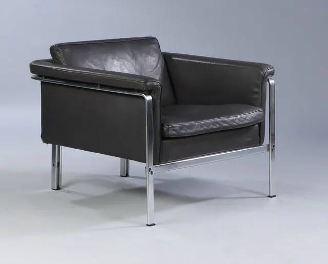 Horst Brüning. Fritstående vintage lounge lænestol, model 6912, sort patineret læder