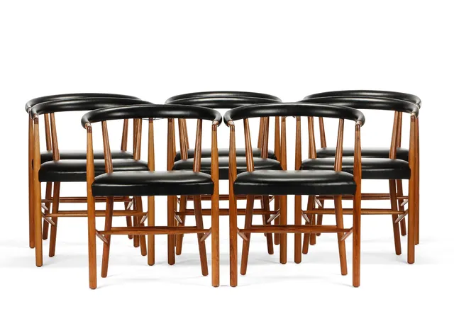 Jacob Kjær. Eight 'FN' armchairs model B48 in walnut (8)