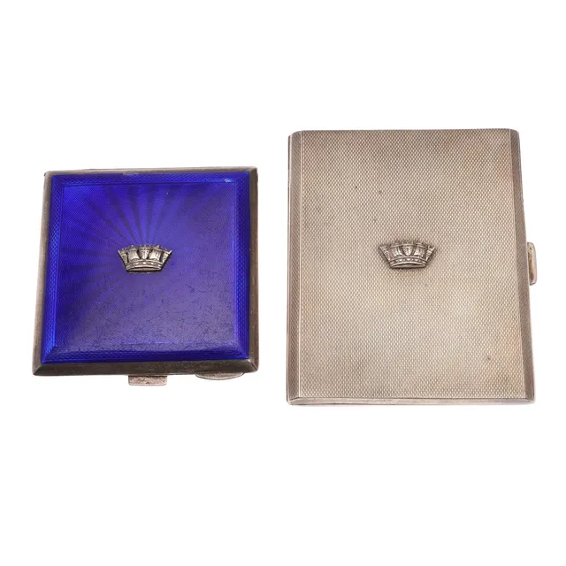 A SILVER CIGARETTE CASE AND A SILVER AND ENAMEL COMPACT.
