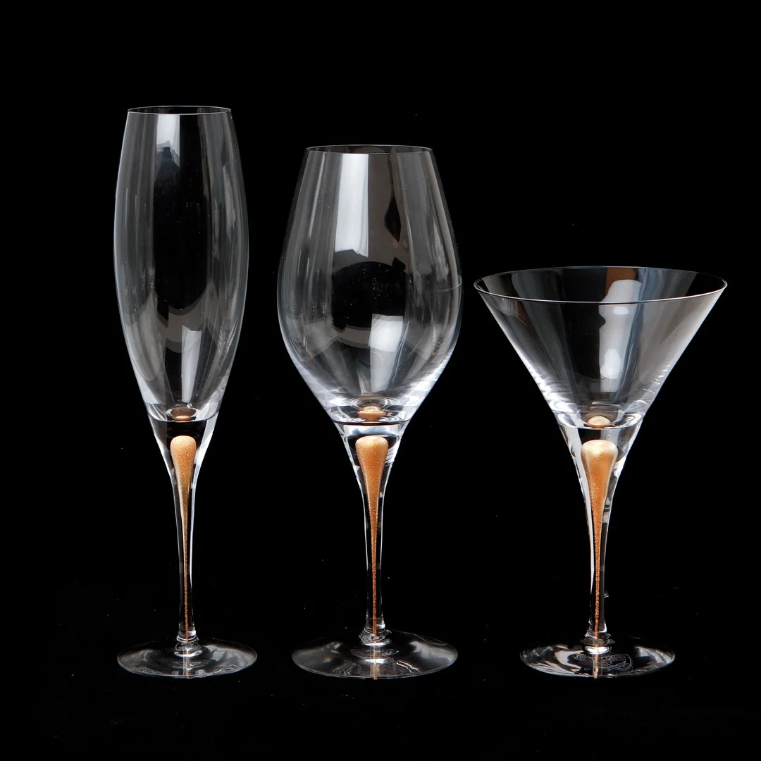 ERIKA LAGERBIELKE. Glasservisdelar, 9 stycken, "Intermezzo gold", Orrefors. — Utility glass — Göteborgs Auktionsverk