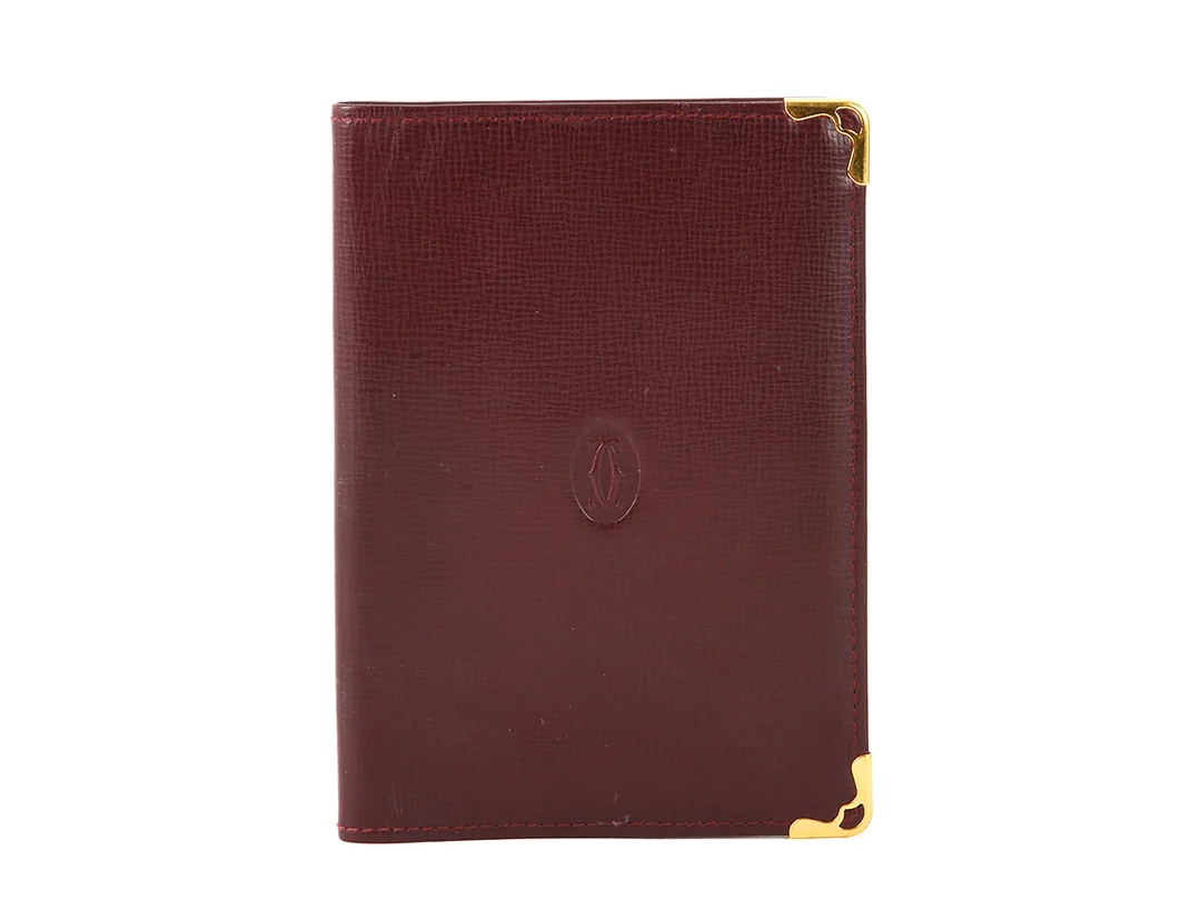 PASSFODRAL, CARTIER, vintage, vinrött läder, 13x9cm. — Accessoarer/Plånböcker — Kaplans