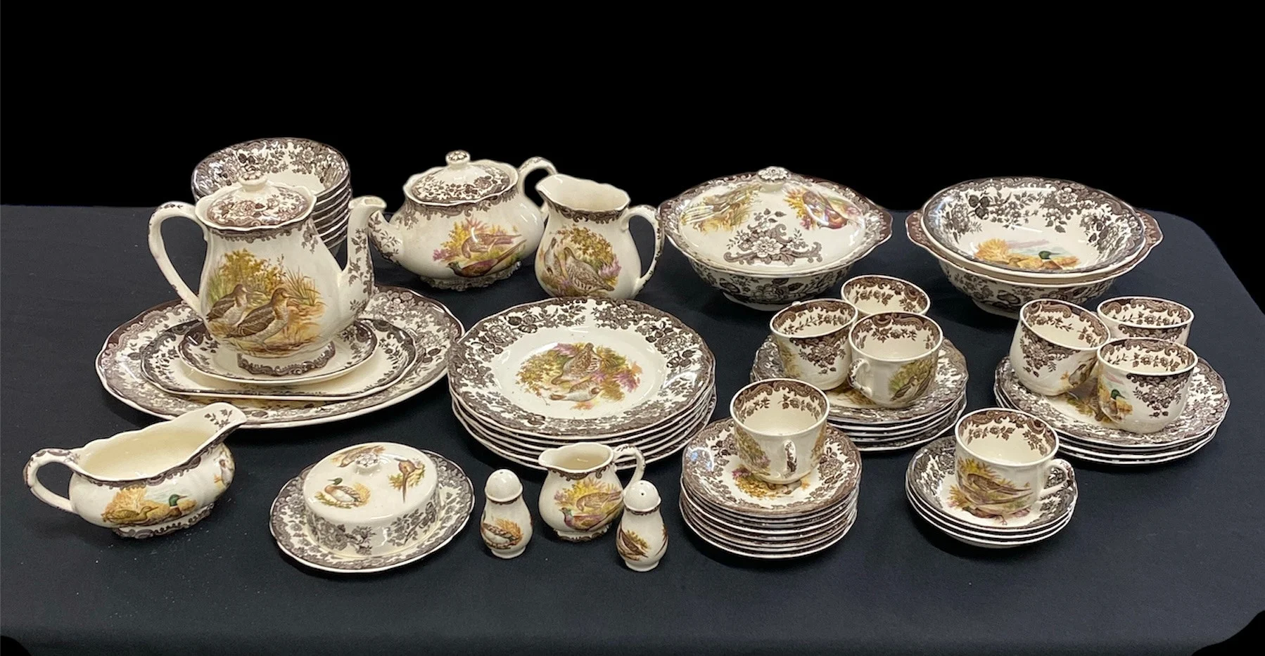 A ROYAL WORCESTER PALISSY GAME BIRDS SERIES PATTERN PORCELAIN DINNER SERVICE. — European — Bishop & Miller