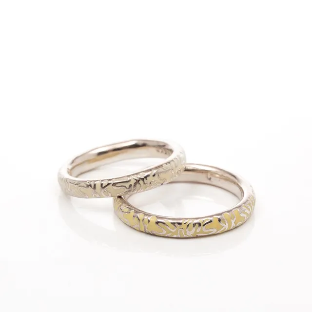 HANS HENRIK NYGAARD. Ringar, 2 st, Sterlingsilver, Spinning.