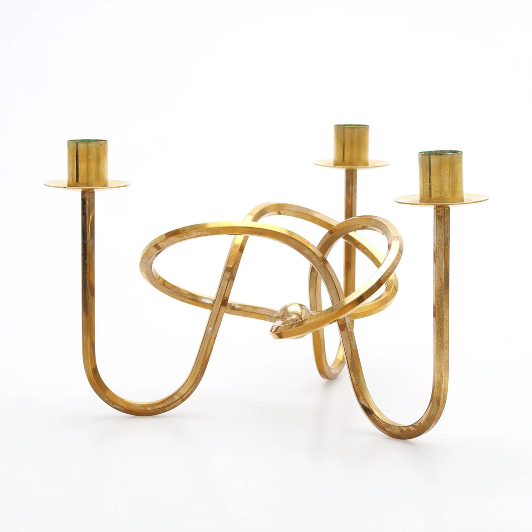 JOSEF FRANK. "Vänskapsknuten", ljusstake, Firma Svenskt Tenn, 1900-talets andra hälft. — Candlesticks — Växjö Auktionskammare