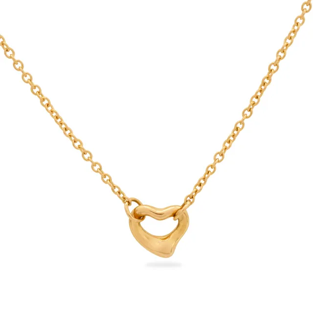 TIFFANY & CO. Open Heart & Diamonds by the Yard" Halskæde af 18 kt. guld prydet med vedhæng i form af hjerte og to brillantslebne diamanter. Design af Elsa Peretti.