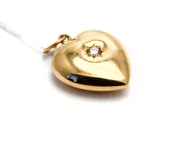 Hänge, skadat 18K 1,4g