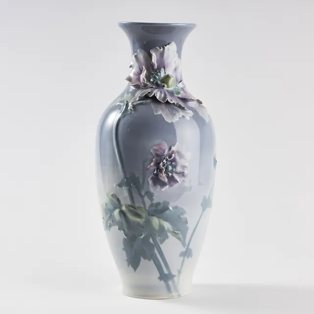 ALGOT ERIKSSON. Vase, Rörstrand, Art Nouveau, porcelain, decoration of flowers in relief in the colors blue, pink, violet and green.
