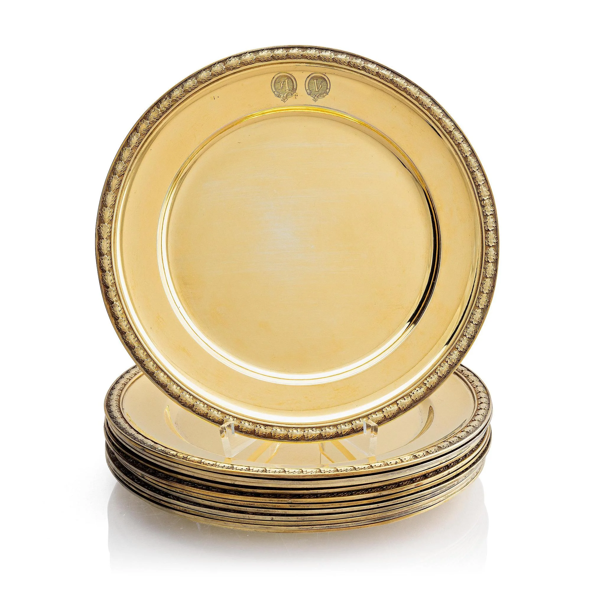 C.G. Hallberg, tallrikar, 12 st, förgyllt silver, Stockholm 1913-1917. — Bukowskis