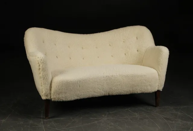 Slagelse Møbelværk. Two-seater sofa, Model 185, recently reupholstered in lambskin