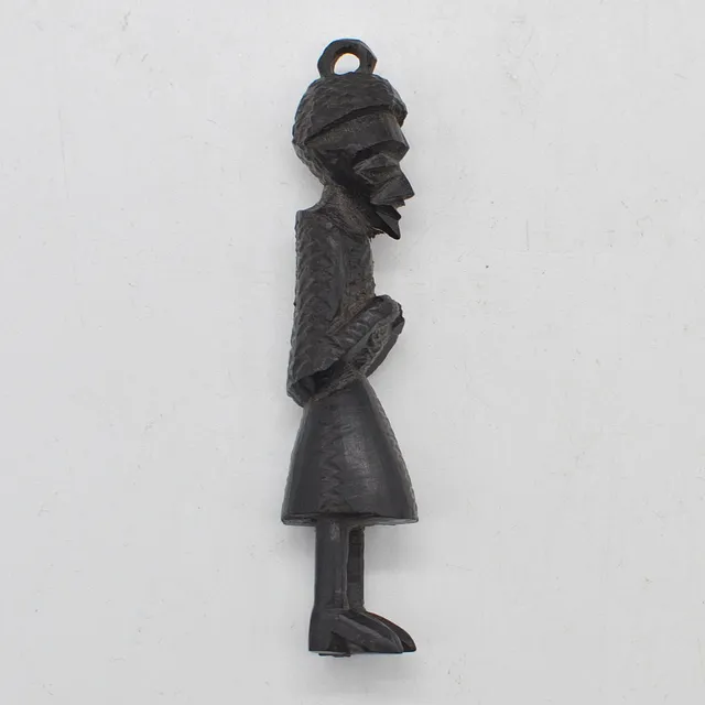 AFRIKANISCHER ANHÄNGER, MÄNNLICHE FIGUR, EBENHOLZ, HANDGESCHNITZT, 20. JAHRHUNDERT.
