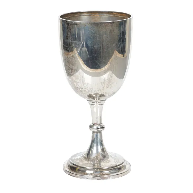 A GEORGE V SILVER TROPHY CUP.