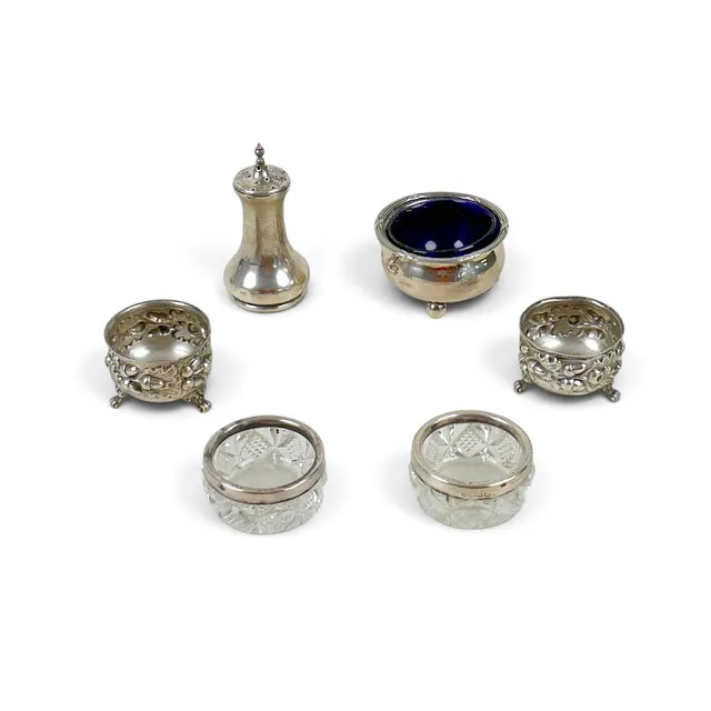 A COLLECTION OF VICTORIAN AND LATER SILVER CRUETS.