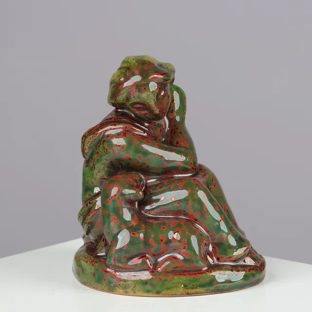 GERTRUD KUDIELKA (1896-1984). Sculpture of seated woman with lamb, stoneware glazed in green and reddish hues, model no. 516, Lauritz Hjorth, Bornholm, Denmark, 1930s.