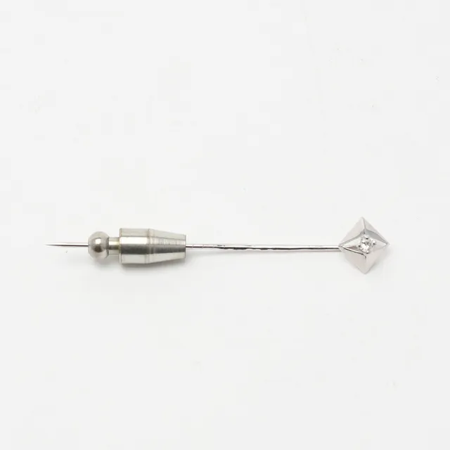 KRÅSNÅL, Guld 18K med briljantslipad diamant ca 0,05 ct, Alton.