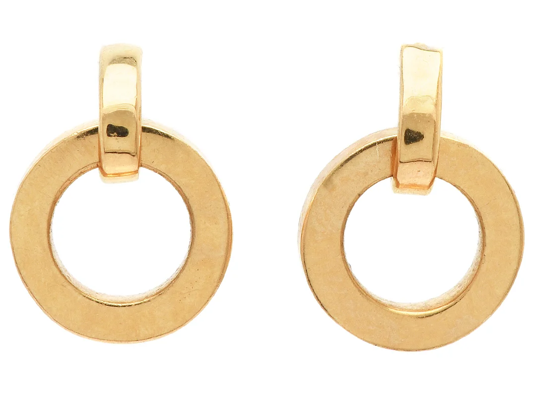 ÖRHÄNGEN, 18K guld, stift, höjd 1,3 cm, vikt 3,6 g, en snurrebuss i silver. — Smycken/Örhängen — Kaplans