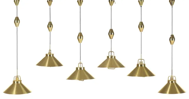 Frits Schlegel: Set of six brass pendants, adjustable height mechanism and brass canopy. Model P 295. Manufactured and marked by Lyfa. H. 35. Diam. 44 cm. (6)