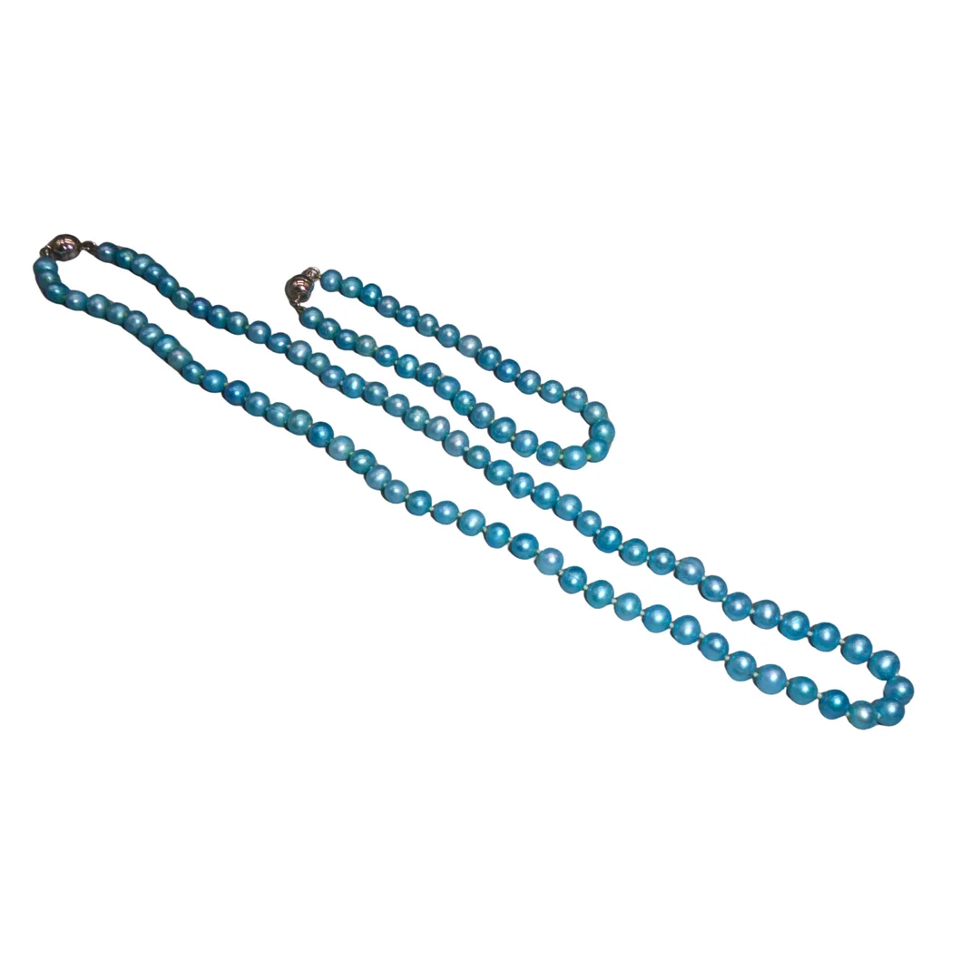 TAHITI PERLEN SCHMUCKSET - HALSKETTE UND ARMBAND. — Jewellery Suites — Auktionshaus Stuber's Hammerschlag
