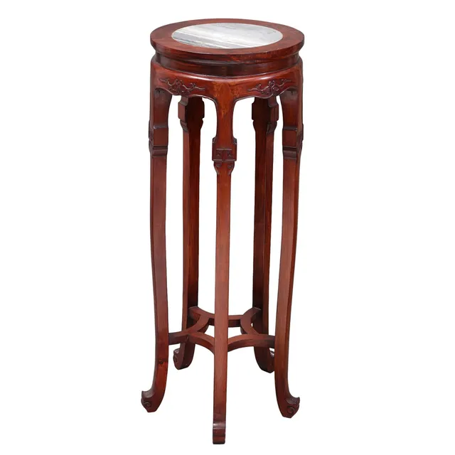 Chinese carved wood pedestal with marble top, 20th Century.