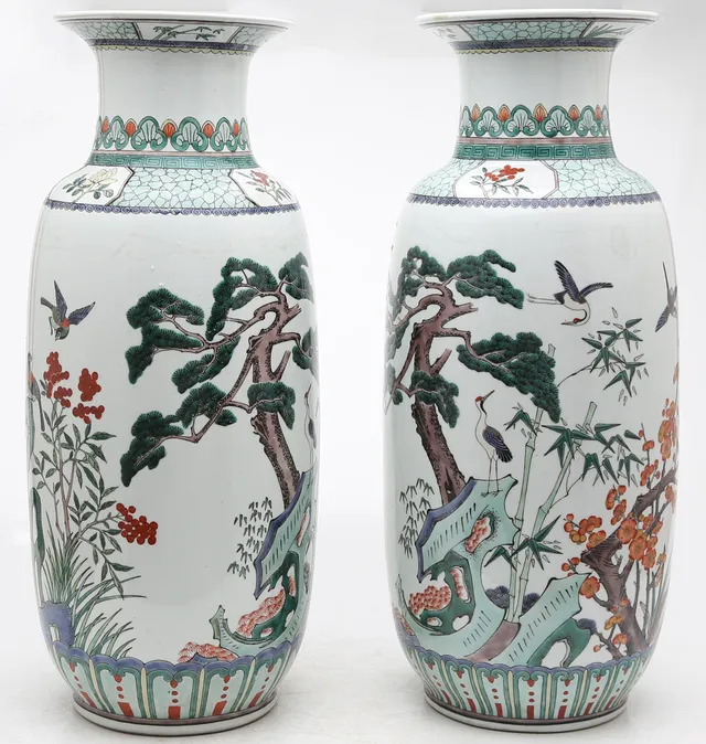 Pair of Chinese vases in green family porcelain, after Qianlong models, XX century.