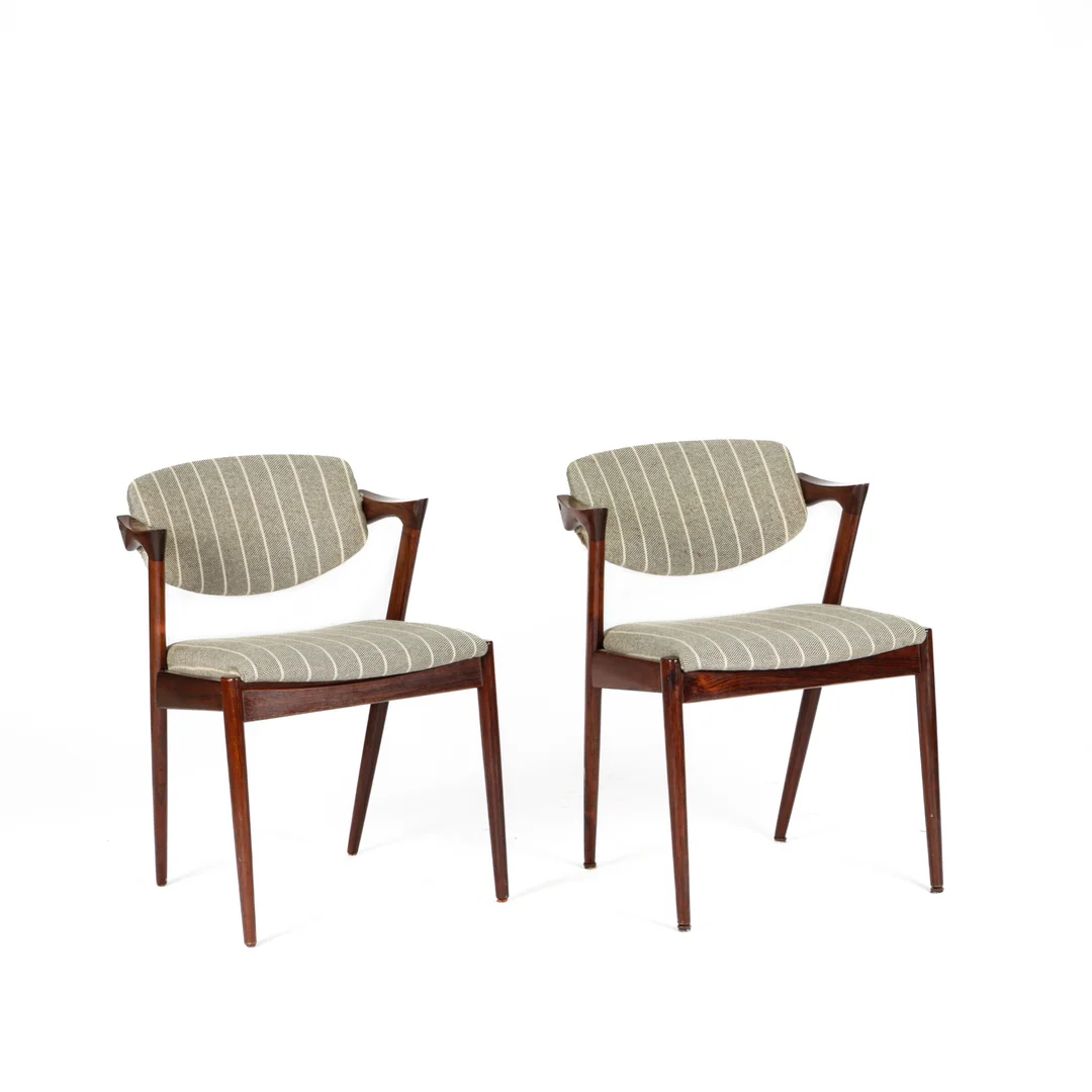 Kai Kristiansen. A pair of rosewood armchairs, model 42 (2) — Furniture/Chairs — Lauritz