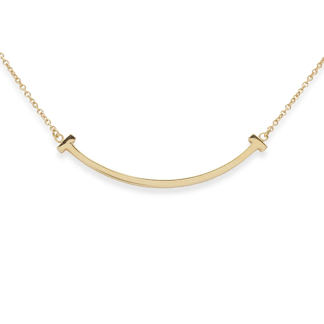 TIFFANY & CO. Tiffany T collection, 'T Smile' halskæde af 18 kt guld. — Necklace — Palsgaard Kunstauktioner