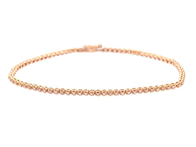 TENNISARMBAND, 18K roséguld, briljantslipade diamanter ca 0,30 ctv, ca TW-Cr/P, längd 17 cm, vikt 5,0 g, flera diamanter har nagg.