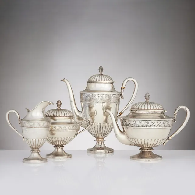 CG HALLBERG. Kaffe- och teservis, fyra delar, silver, Stockholm 1893-1895. Empire-stil.