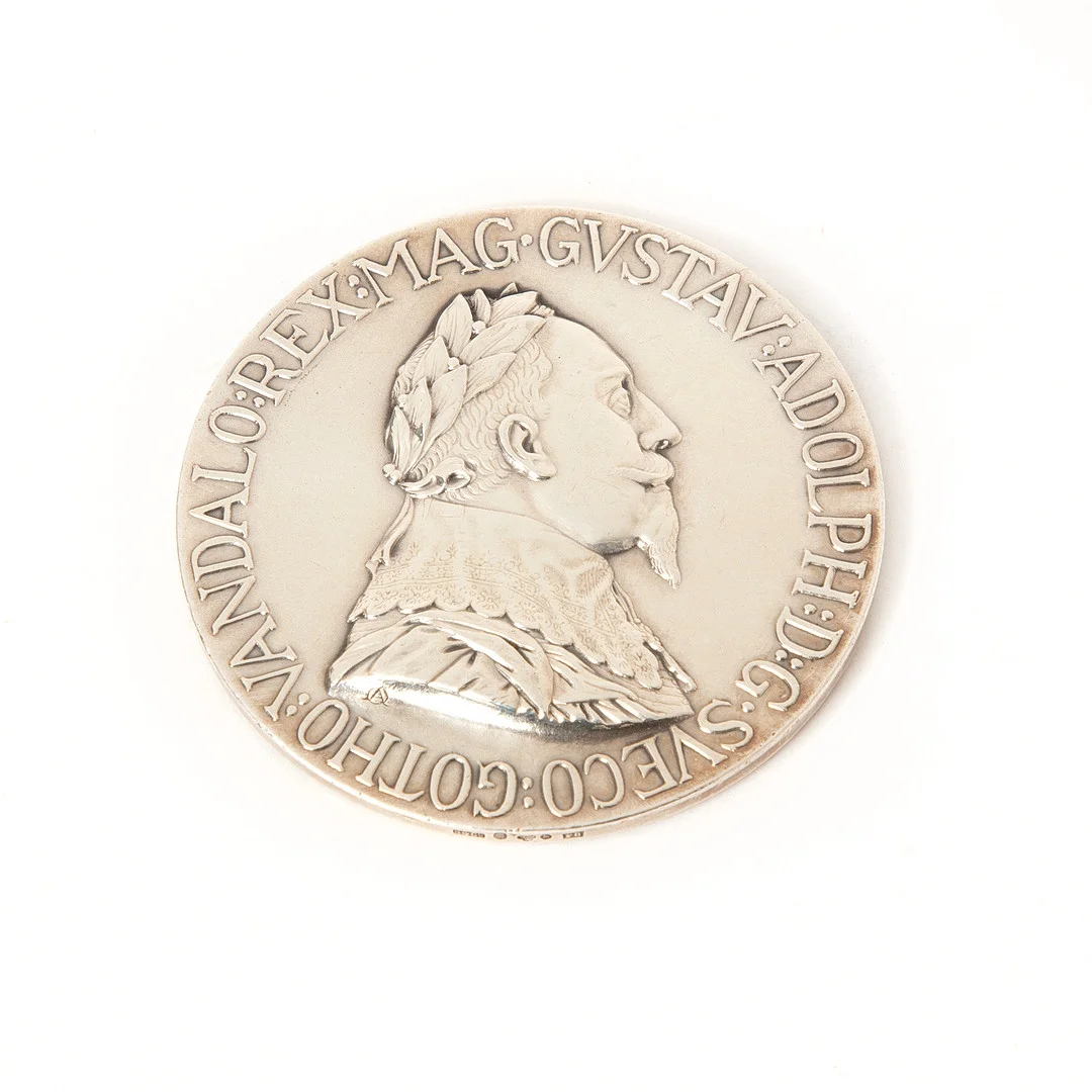 MEDALJ, silver, Gustav Adolph, Sandberg O Cederholms Guldsmedsverksatd, Trelleborg, 1932. — Orders & Medals — Stockholms Auktionsverk Göteborg