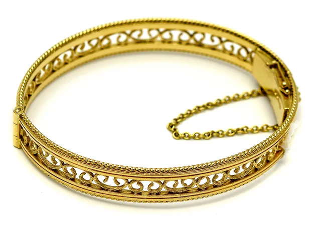 Armring 18K 35,4g, öppningsbar, med säkerhetskedja