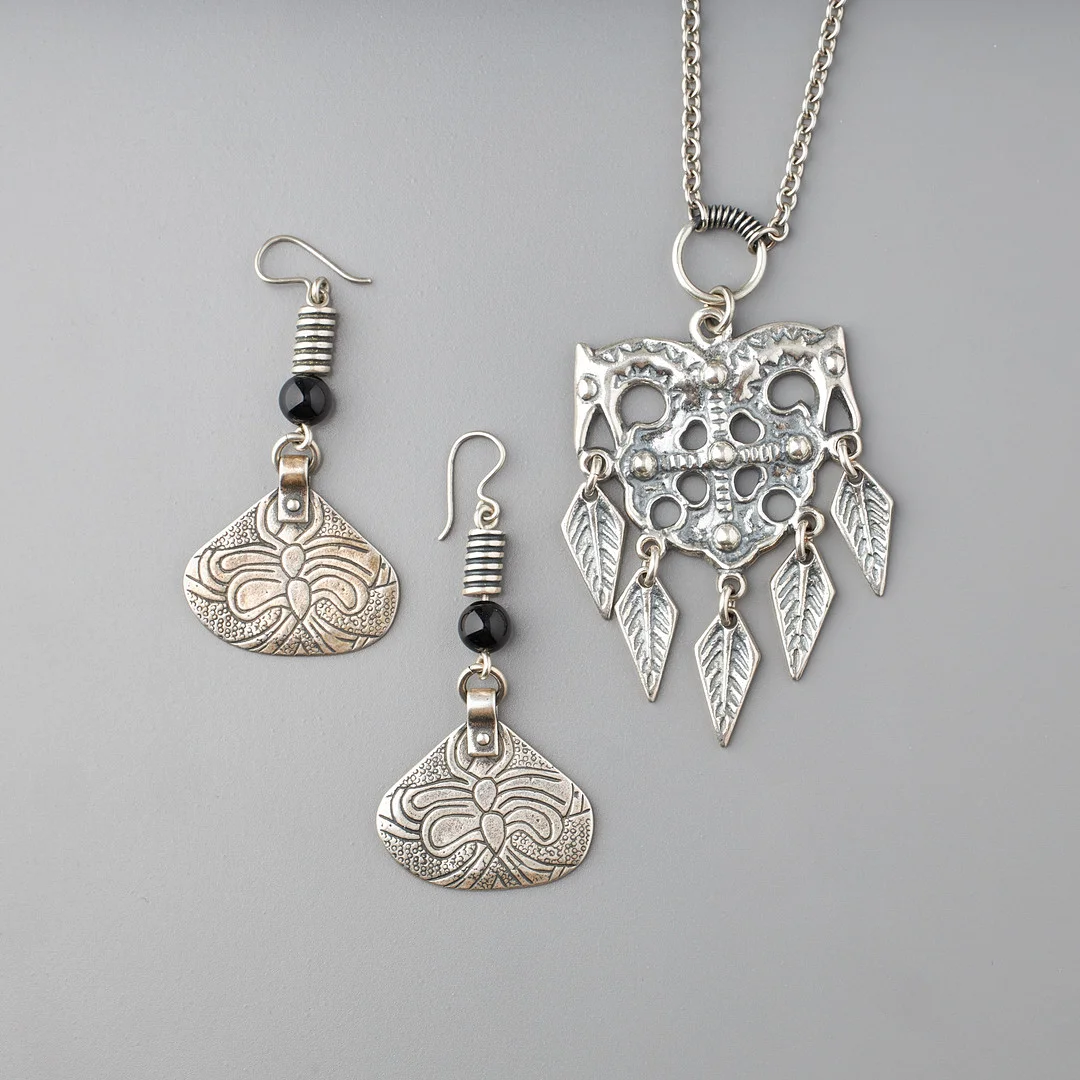 KALEVALA KORU, 2 st, hänge och örhängen, silver, 1992-97. — Jewellery Suites — Stockholms Auktionsverk Helsinki